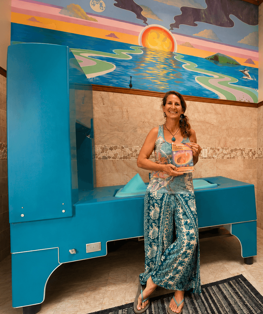 Silke standing in her colon hydrotherapy treatment room